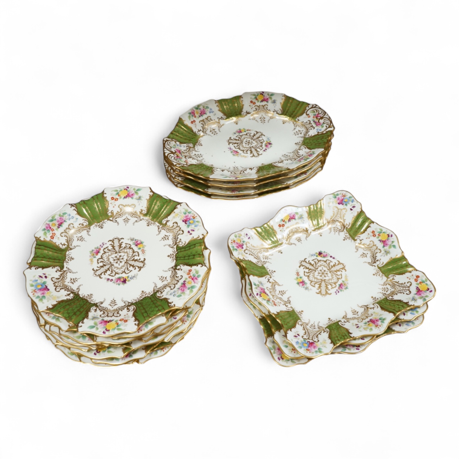 An early 20th century Wedgwood gilt and floral decorated dessert service, oval dishes 26cm wide (18).